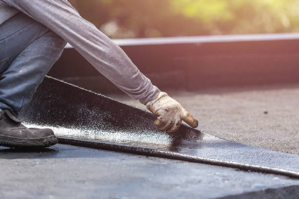 Professional Basement Waterproofing technician working in Oakley, MI